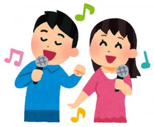 男女が歌うイラスト